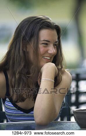 people, sitting, outdoors, brunette, teenager View Large Photo Image Stock Image - people, sitting, outdoors, brunette, teenager. Fotosearch