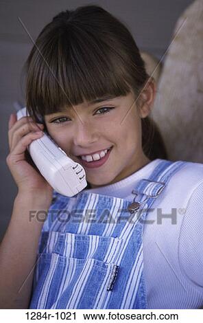 people, smiling, telephone, talking, Hispanic, phone, girl View Large Photo Image Stock Image - people, smiling, telephone, talking, Hispanic, phone, girl. Fotosearch