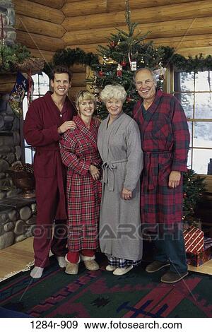 people, smiling, winter, Christmas, smile, family, Christmas tree View Large Photo Image Stock Photo - people, smiling, winter, Christmas, smile, family, Christmas tree. Fotosearch