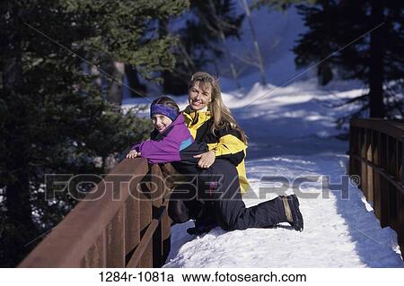 people, snow, mother, winter, outdoors, family View Large Photo Image Stock Image - people, snow, mother, winter, outdoors, family. Fotosearch