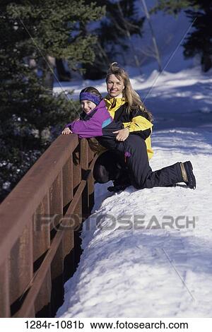 people, snow, railing, mother, winter, outdoors, family View Large Photo Image Stock Image - people, snow, railing, mother, winter, outdoors, family. Fotosearch