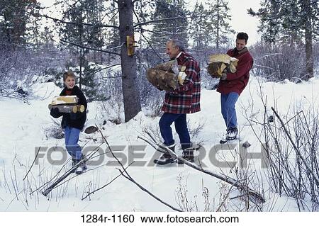 Stock Image - people, snow, winter, three, outdoors, carrying. Fotosearch