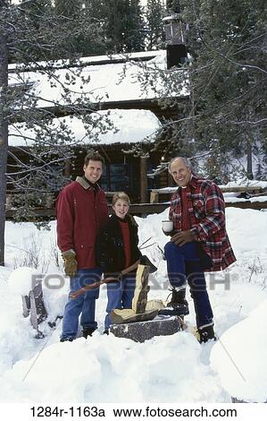 Stock Image - people, snow, winter, three, outdoors, family. Fotosearch