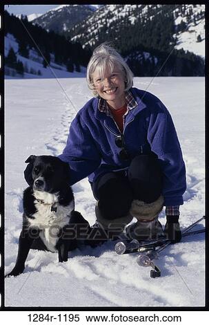 people, snow, woman, dog, senior, winter, pet View Large Photo Image Stock Photography - people, snow, woman, dog, senior, winter, pet. Fotosearch