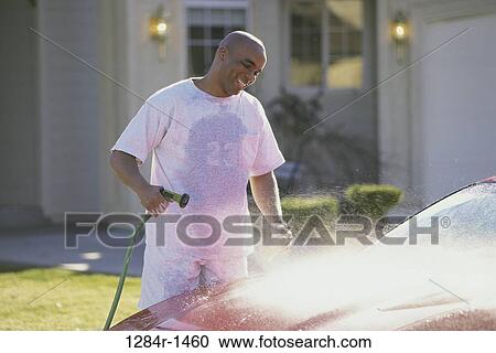 people, spraying, car, outdoors, transportation View Large Photo Image Stock Image - people, spraying, car, outdoors, transportation. Fotosearch
