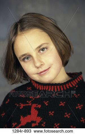 Stock Image - people, sweater, girl, child, portrait, brunette, indoors. Fotosearch