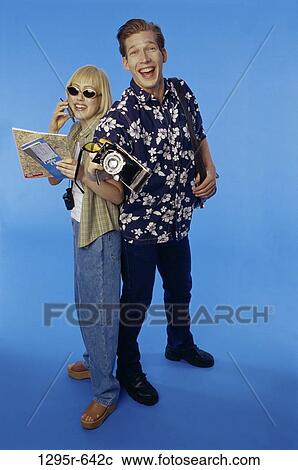people, talking, couple, phone, sunglasses, camera, maps View Large Photo Image Stock Image - people, talking, couple, phone, sunglasses, camera, maps. Fotosearch