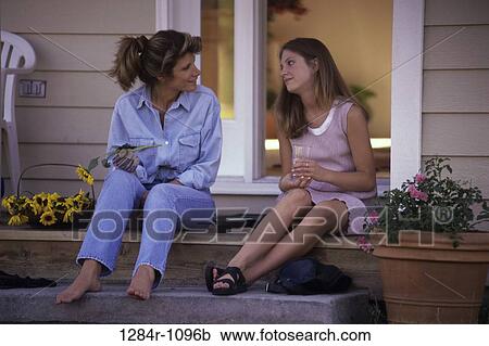 people, talking, mother, sunflowers, outdoors, serious View Large Photo Image Stock Image - people, talking, mother, sunflowers, outdoors, serious. Fotosearch