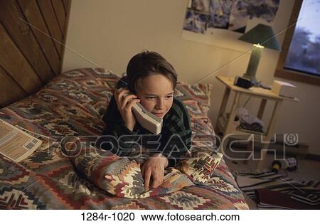 people, telephone, talking, phone, bed, boy View Large Photo Image Stock Image - people, telephone, talking, phone, bed, boy. Fotosearch