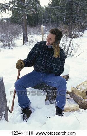 Stock Image - people, telephone, talking, winter, phone, outdoors. Fotosearch