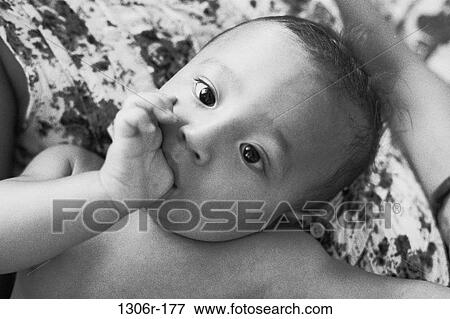 people, thumb, Asian, baby, black and white View Large Photo Image Stock Photo - people, thumb, Asian, baby, black and white. Fotosearch