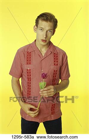Stock Image - people, tulip, flower, romantic, blond, romance. Fotosearch