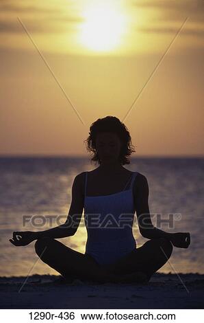 Stock Photograph - people, water, woman, sun, sunset, beach, health. Fotosearch