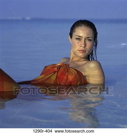 people, woman, beach, brunette, Caucasian View Large Photo Image Picture - people, woman, beach, brunette, Caucasian. Fotosearch