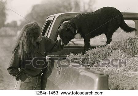 people, woman, dog, hay, pet, outdoors View Large Photo Image Stock Image - people, woman, dog, hay, pet, outdoors. Fotosearch