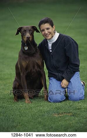 people, woman, dog, Hispanic, pet, outdoors, portrait View Large Photo Image Stock Image - people, woman, dog, Hispanic, pet, outdoors, portrait. Fotosearch