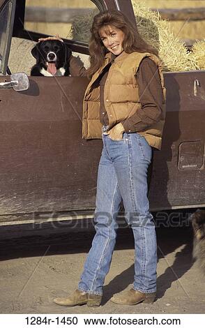 people, woman, dog, pet, outdoors, transportation, vest View Large Photo Image Stock Image - people, woman, dog, pet, outdoors, transportation, vest. Fotosearch