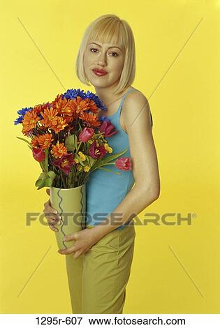 people, woman, flowers, blond, vase, indoors, Caucasian View Large Photo Image Stock Photo - people, woman, flowers, blond, vase, indoors, Caucasian. Fotosearch
