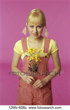 people, woman, flowers, pigtails, indoors, Caucasian View Large Photo Image Stock Image - people, woman, flowers, pigtails, indoors, Caucasian. Fotosearch