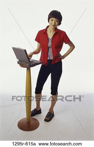 people, woman, headset, Asian, computer, laptop, phone View Large Photo Image Stock Image - people, woman, headset, Asian, computer, laptop, phone. Fotosearch