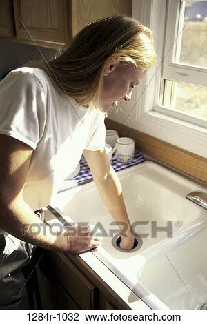 people, woman, reaching, sink, drain, indoors View Large Photo Image Stock Image - people, woman, reaching, sink, drain, indoors. Fotosearch