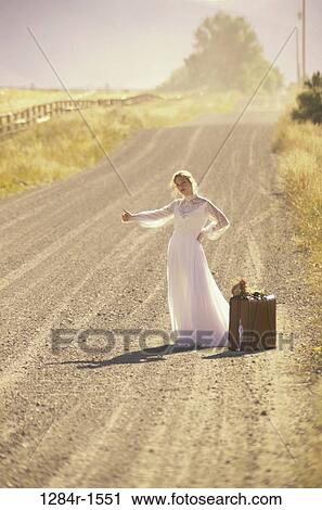 Stock Image - people, woman, road, outdoors, frustrated, wedding, frustration. Fotosearch