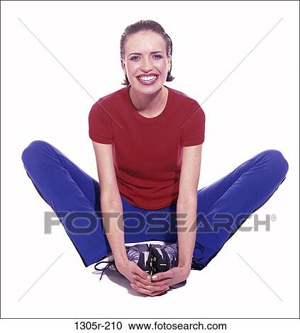 Stock Image - people, woman, smiling, sitting, stretching, smile, brunette. Fotosearch
