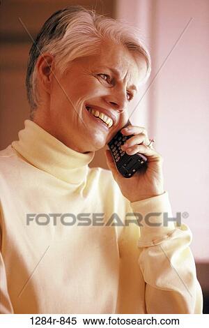Stock Photography - people, woman, telephone, talking, senior, phone. Fotosearch