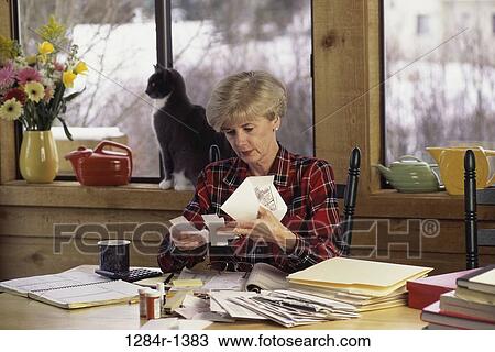 people, woman, window, cat, pet, Middle-aged View Large Photo Image Stock Image - people, woman, window, cat, pet, Middle-aged. Fotosearch