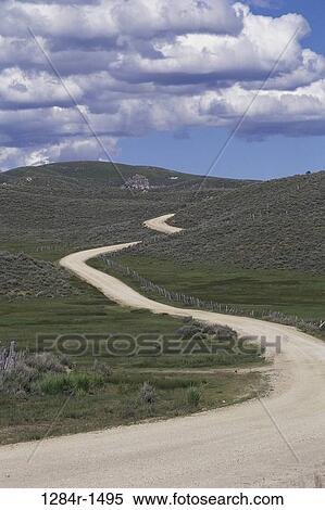 road, dirt, winding, curving, nature, path View Large Photo Image Stock Photography - road, dirt, winding, curving, nature, path. Fotosearch