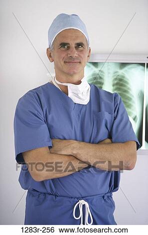 skeleton, scrubs, doctor, surgeon, medicine, Middle-aged View Large Photo Image Stock Photograph - skeleton, scrubs, doctor, surgeon, medicine, Middle-aged. Fotosearch