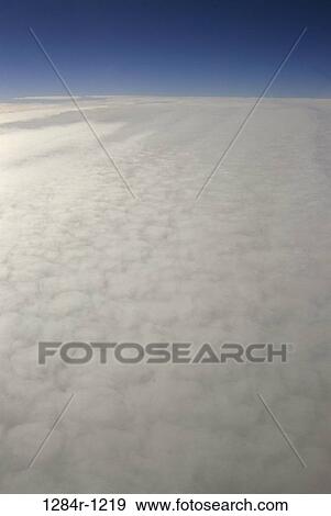 sky, floating, clouds, cloudy, covering, nature, horizon View Large Photo Image Stock Photo - sky, floating, clouds, cloudy, covering, nature, horizon. Fotosearch