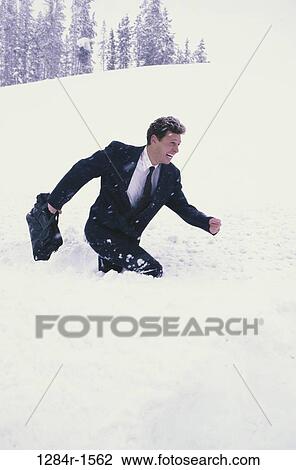 snow, walking, briefcase, winter, business, commitment View Large Photo Image Stock Image - snow, walking, briefcase, winter, business, commitment. Fotosearch