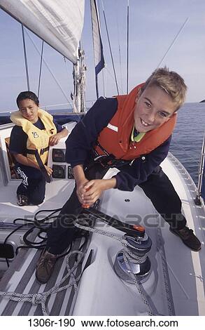 sports, water sports, boat, children, sailboat, boys, sailing View Large Photo Image Stock Image - sports, water sports, boat, children, sailboat, boys, sailing. Fotosearch