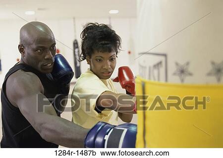 teacher, sports, gloves, punching, teaching, indoors View Large Photo Image Stock Image - teacher, sports, gloves, punching, teaching, indoors. Fotosearch
