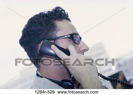 telephone, talking, eyeglasses, phone, business View Large Photo Image Stock Photo - telephone, talking, eyeglasses, phone, business. Fotosearch