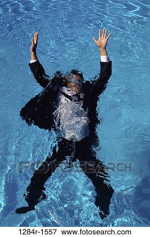 water, pool, drowning, business, swimming pool, sink View Large Photo Image Stock Photo - water, pool, drowning, business, swimming pool, sink. Fotosearch