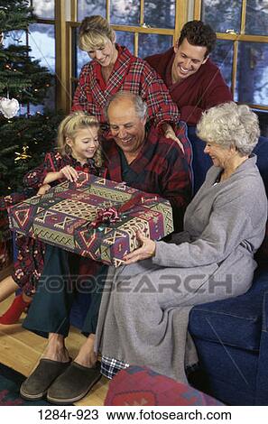 winter, Christmas, family, decorations, Christmas tree, gift, present View Large Photo Image Stock Image - winter, Christmas, family, decorations, Christmas tree, gift, present. Fotosearch