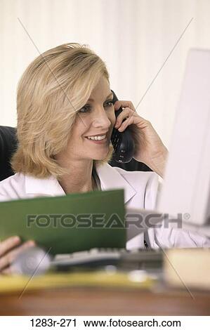 woman, computer, phone, doctor, chart, medicine, Middle-aged View Large Photo Image Stock Image - woman, computer, phone, doctor, chart, medicine, Middle-aged. Fotosearch