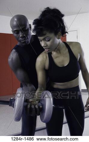woman, health, sports, exercise, lifting, weights, weight View Large Photo Image Stock Photograph - woman, health, sports, exercise, lifting, weights, weight. Fotosearch