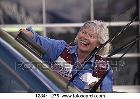 Stock Photography - woman, senior, car, blades, outdoors, transportation. Fotosearch