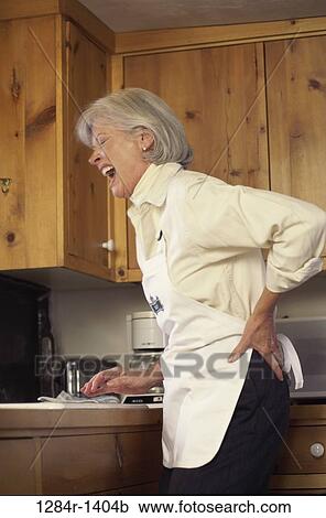 Stock Image - woman, senior, patient, back, health, pain, screaming. Fotosearch