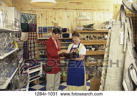 Stock Image - women, people, Middle-aged, shopping, store, shop. Fotosearch