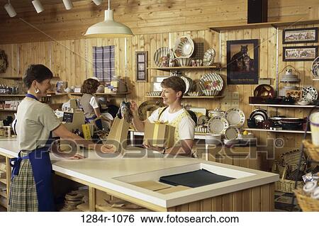 women, people, shopping, cashier, register, indoors View Large Photo Image Stock Photograph - women, people, shopping, cashier, register, indoors. Fotosearch
