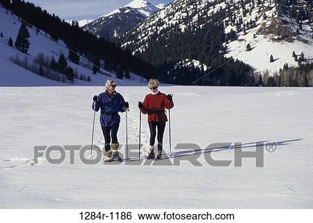women, snow, skiing, senior, winter, mountains View Large Photo Image Stock Photograph - women, snow, skiing, senior, winter, mountains. Fotosearch