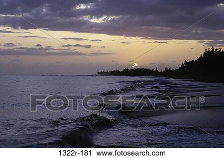 Stock Image - clouds, sunset, beach, nature, waves, sunrise, coastline. Fotosearch
