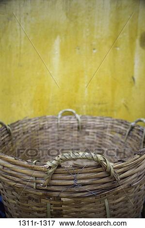 Stock Photo - empty, round, large, basket, wall, still life. Fotosearch