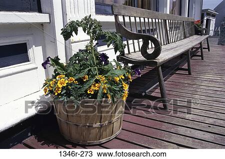 Stock Image - exterior, bench, flowers, residential, architecture, house. Fotosearch