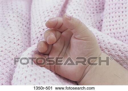 Stock Image - hand, baby, body parts, blanket, Caucasian, Body parts hands. Fotosearch