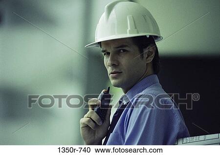 industry, construction, holding, worker, watching View Large Photo Image Stock Image - industry, construction, holding, worker, watching. Fotosearch
